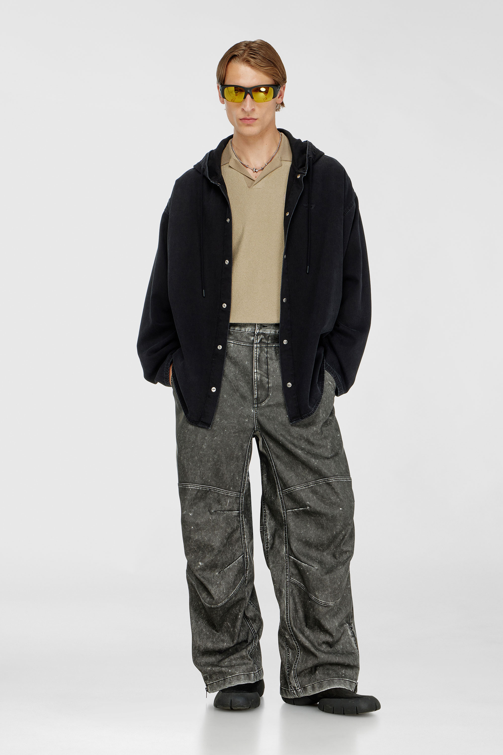 Pants in distressed-effect bonded material
